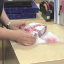 Learn To Wrap A Gift In 10 Seconds With This Gift Wrapping Hack [VIDEO]